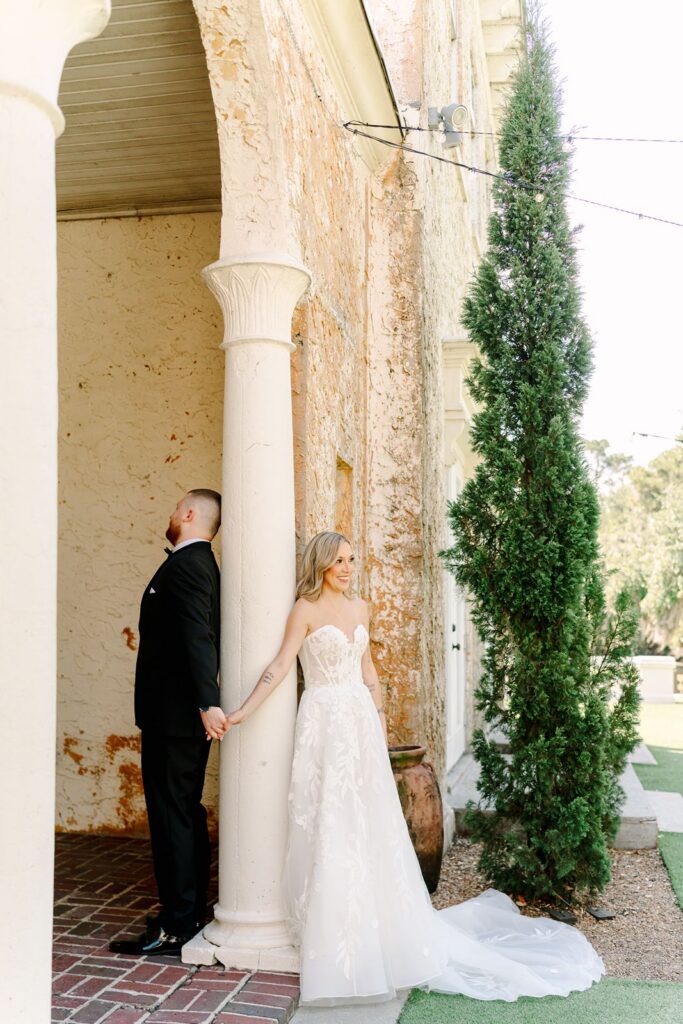Bride and Groom first touch at Bella Cosa Wedding Venue