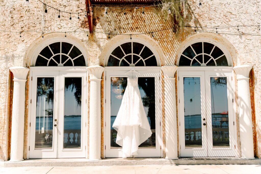 Wedding Dress hanging outside at Bella Cosa Wedding Venue
