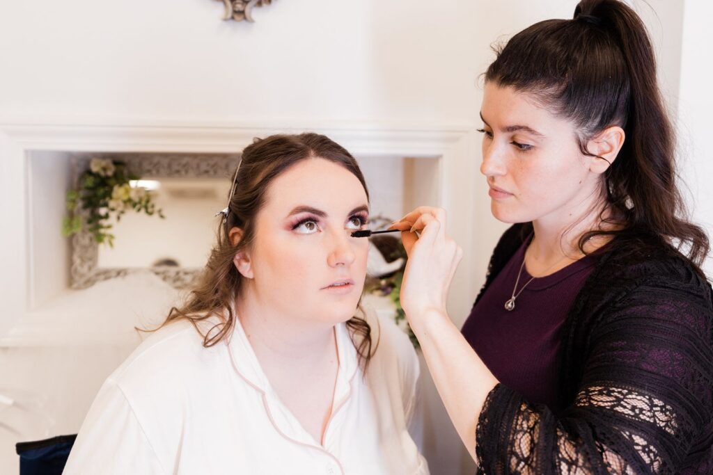 Bride having her makeup done at the Granville Plantation