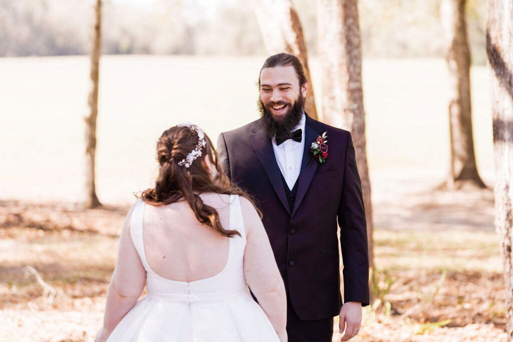Bride and groom first touch at their Granville Plantation wedding