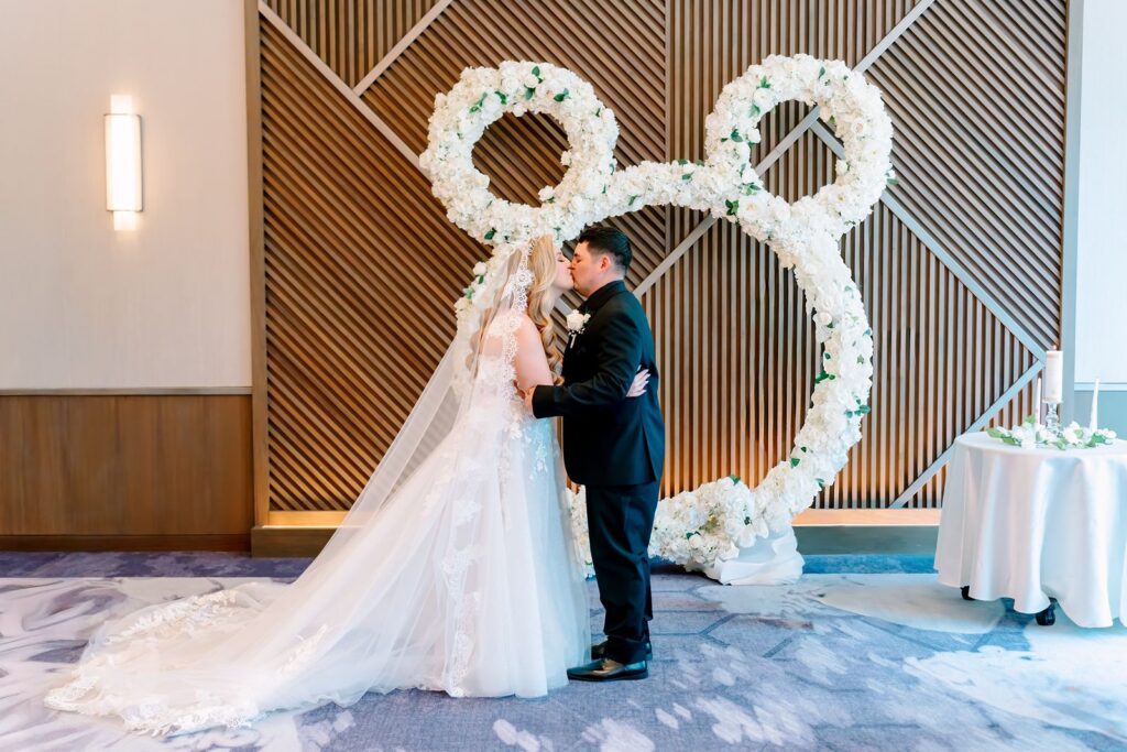 Bride and Groom first kiss at the Walt Disney World Swan and Dolphin